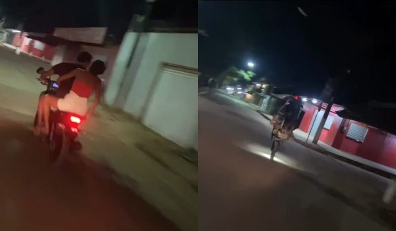 casal caindo de motocicleta durante manobra