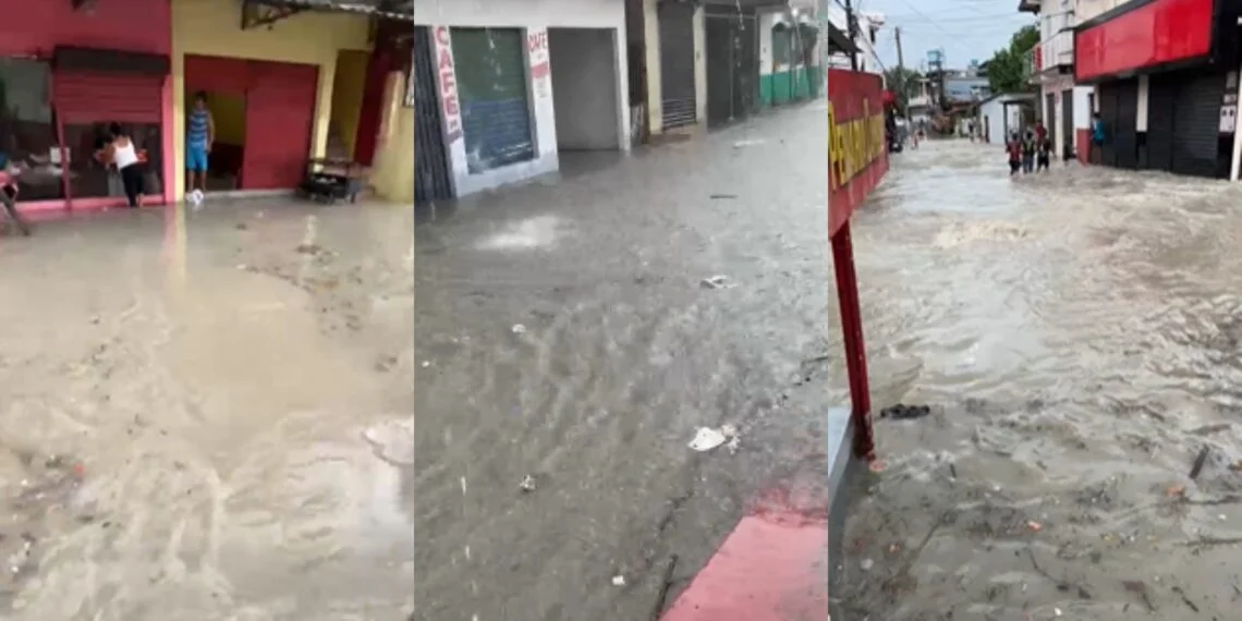 Rua Américo Vespuccio alagada em Manaus devido à chuva forte