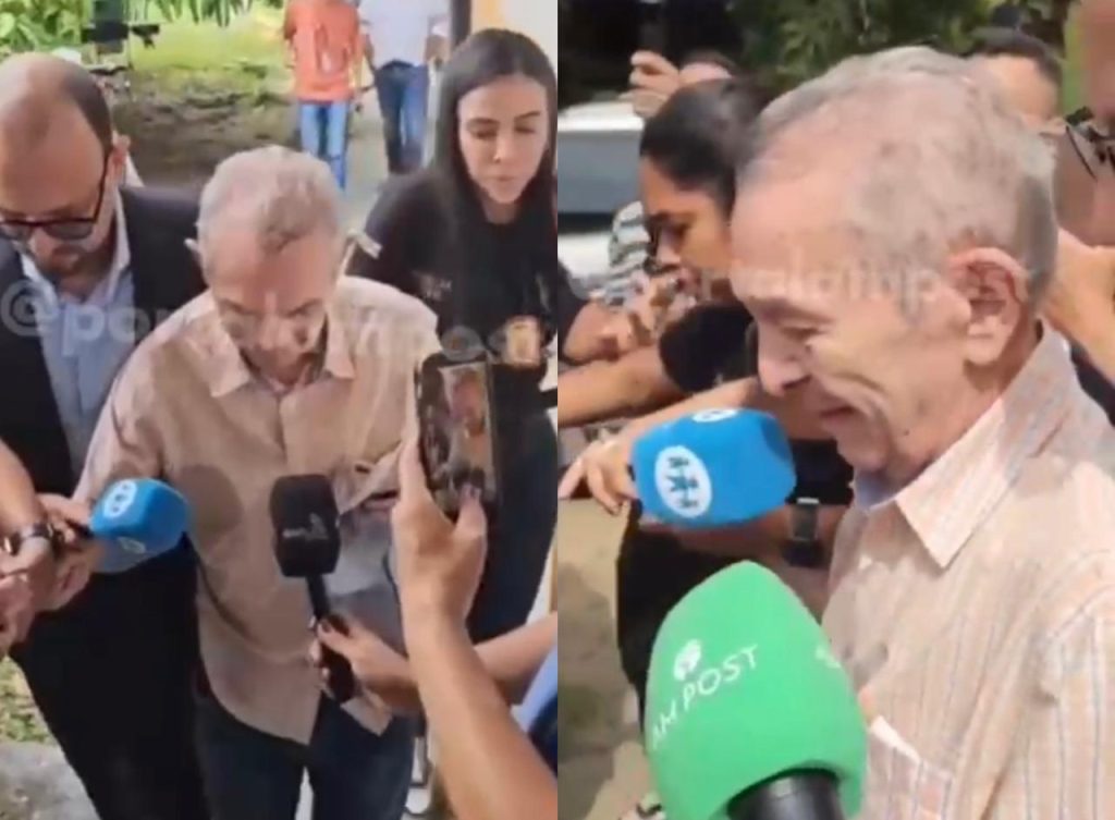Ex-desembargador Rafael Romano chegando ao IML de Manaus acompanhado de advogados para realizar exames após se entregar à polícia.