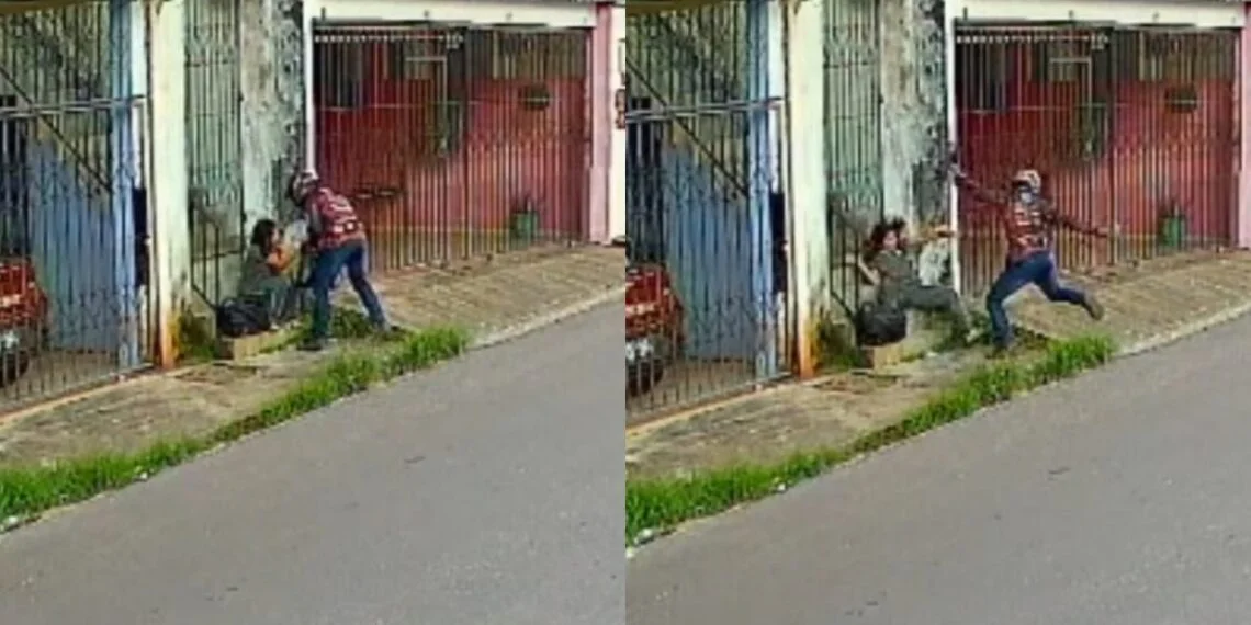 Homem em motocicleta vermelha aborda estudante na calçada no bairro Novo Aleixo em Manaus durante assalto.