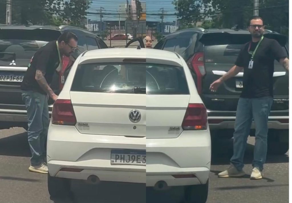 Motorista visivelmente alterado gesticulando de forma agressiva contra uma mulher dentro de um carro no trânsito de Manaus
