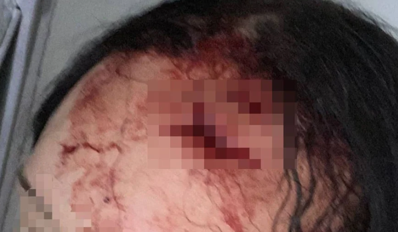 Policial militar realizando a prisão de um suspeito de agressão contra mulher no distrito federal.