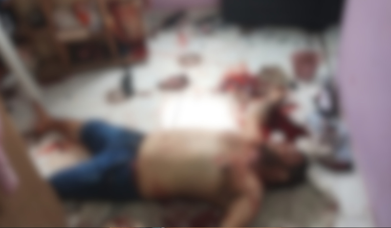 Cena de isolamento policial em rua da zona norte de Manaus após execução a tiros de um homem.