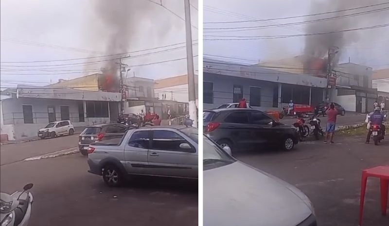 Prédio atingido por incêndio no bairro Santo Antônio em Manaus com equipes do Corpo de Bombeiros no local