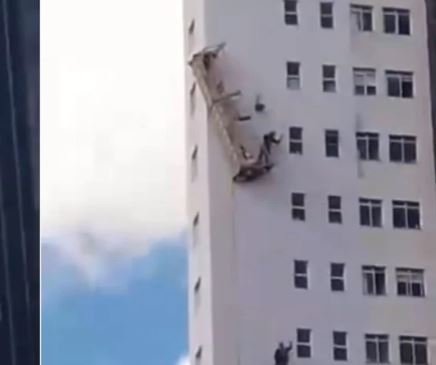 trabalhadores pendurados em andaime durante acidente em belo horizonte