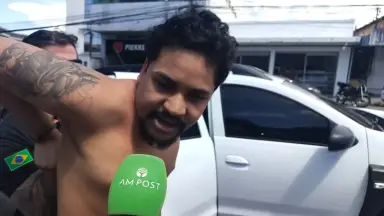 Homem que ameaçou metralhar viatura debocha da polícia na porta de delegacia em Manaus